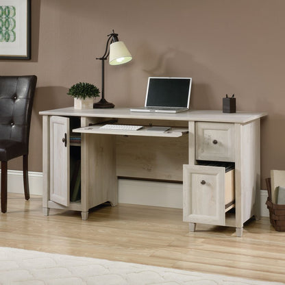 Teknik Office Chalked Wood Computer Desk with a chalked effect chestnut finish, 2 storage drawers, a flip down keyboard drawer and vertical storage area.