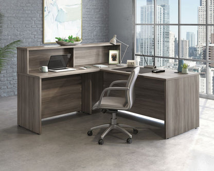 Teknik Office Affiliate Return Unit Desk in a Hudson Elm Effect Finish, 1" Thick Melamine Heat, Stain and Scratch Resistant Top